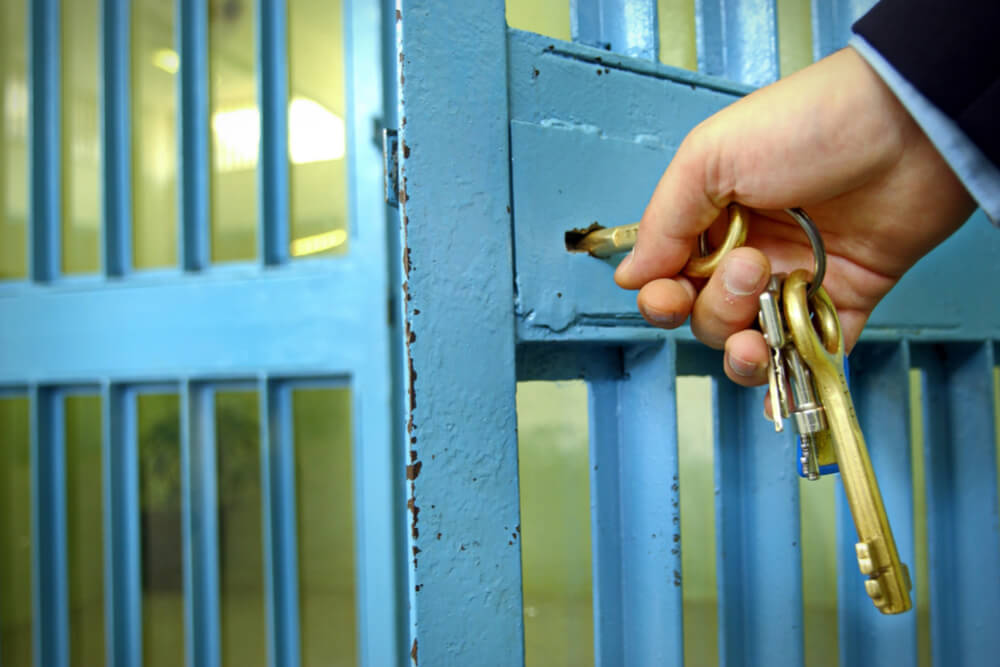 shutterstock 789621847 prison cell key jail